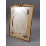 A gilt metal easel type picture frame with velvet and heartsease design ribbon crest, 12 1/2" high