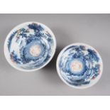 Two Chinese blue and white bowls with later clobbered decoration, larger 8 1/2" dia (chips)