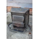 A French enamelled cast iron wood burner, 20" high