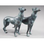 A pair of patinated dogs, 7" high