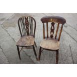 A Windsor splat back chair and a companion wheelback chair