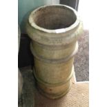 A terracotta chimney pot, 25" high