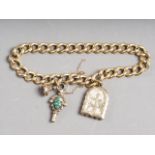 An 18ct gold curb link bracelet, mounted three yellow metal charms, 29g overall