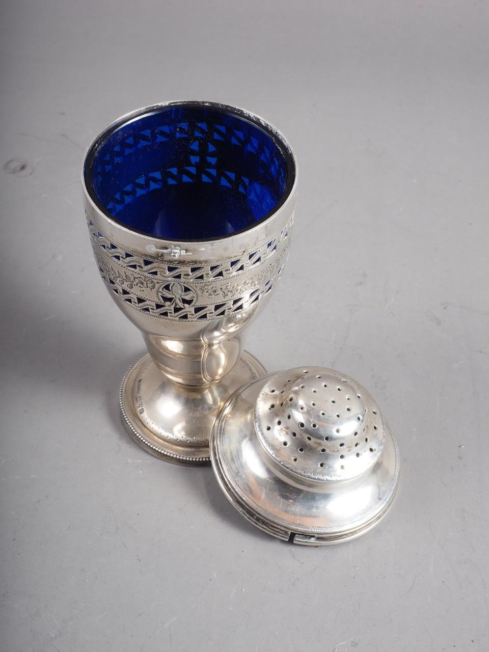 A silver sugar shaker with engraved floral swag decoration and associated white metal top, 2.6oz - Image 2 of 3