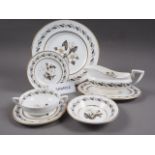 A Royal Worcester bone china "Bernina" pattern part dinner service, including gravy boats, two