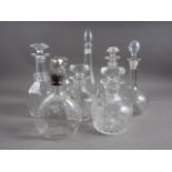 A glass and silver collared jug and stopper, 9" high, a pair of etched glass decanters and five