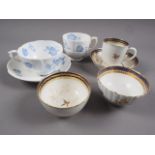 A Caughley tea bowl, saucer and coffee cup, a similar tea bowl, a Grainger Lee & Co Worcester blue