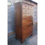 A 19th century mahogany chest on chest of two short drawers and six graduated long drawers, on