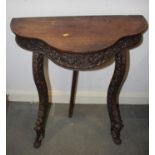 A Kashmir carved walnut shape front console table, on cabriole supports, 28" wide x 15" deep x 31"