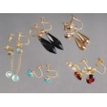 A pair of 9ct gold and turquoise earrings and four other pairs of gold and gold mounted earrings