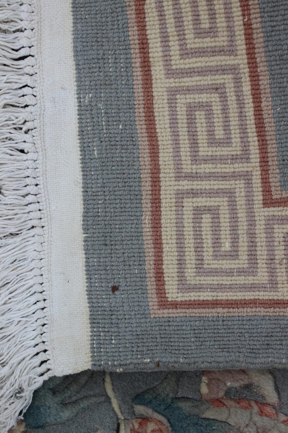 A Chinese contour pile rug with dragon design on a grey ground, 75" x 49" - Image 3 of 3