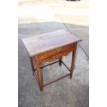 An antique oak elm and walnut side table, fitted one drawer, on chamfered and stretchered