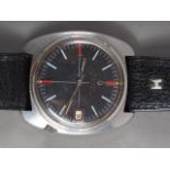 A gentleman's Bulova Accutron stainless steel cased wristwatch with black enamel dial and baton