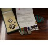 A set of three medals, Defence medal, Coronation medal 1953 and Exemplary Police Service medal,