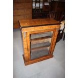 A late 19th century walnut and inlaid gilt brass mounted pier cabinet enclosed glazed panel door, on