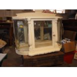 A white painted glass display cabinet, 24 3/4" wide, and a child's vintage pushchair (damages)