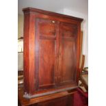 A late 19th century mahogany corner hanging cupboard enclosed two panelled doors, 36" wide x 19"