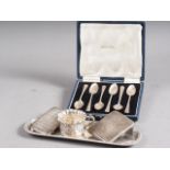 A set of six Mappin & Webb teaspoons, in case, a silver tray, a cigarette case, a card case, an