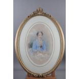 A 19th century watercolour portrait of an unknown woman in blue jacket, 16 1/2" x 11", in oval