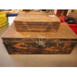 A Royal Navy tin trunk, 30" wide, a German WWI mortar shell carrier and two other small tins