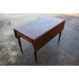 A late 19th century mahogany Pembroke table, fitted one drawer, on turned and castored supports, 42"