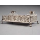 A Godwin & Son silver ink stand with pierced decoration, 19.8oz troy approx, and two associated