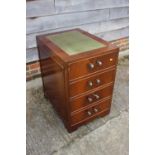 A mahogany two-drawer filing cabinet with tooled leather top, 19" wide x 25" deep x 29" high