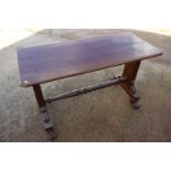 A 19th century walnut rectangular top centre table, on panel end and scroll supports, 48" wide x 20"