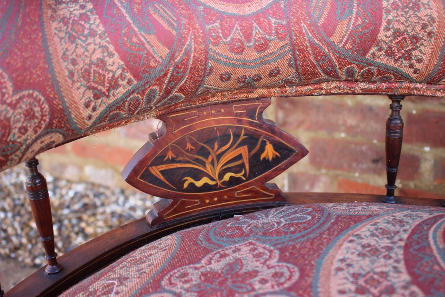 An early 20th century rosewood and line inlaid "conversation" settee with splat and spindle padded - Image 2 of 7