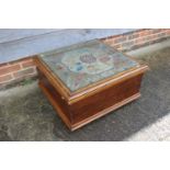 A 19th century box otttoman with embroidered and glazed top, 22" wide x 27" deep x 14" high