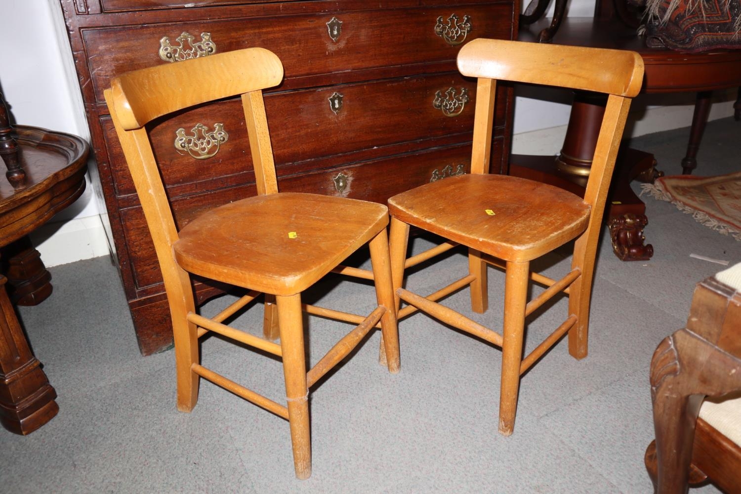 A pair of child's Scandinavian bar back panel seat chairs, on turned and stretchered supports