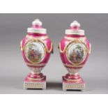 A pair of 19th century Berlin oviform swag decorated vases and covers with figured reserves, on