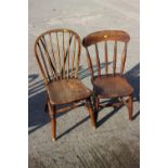 A 19th century Windsor spindle back chair and a similar chair