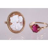 A 9ct gold cameo set dress ring and a 9ct gold ring set red stone