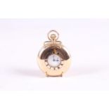 A 9ct gold cased half hunter pocket watch with white enamel dial and Roman numerals