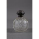 A silver mounted and cut glass globular scent bottle