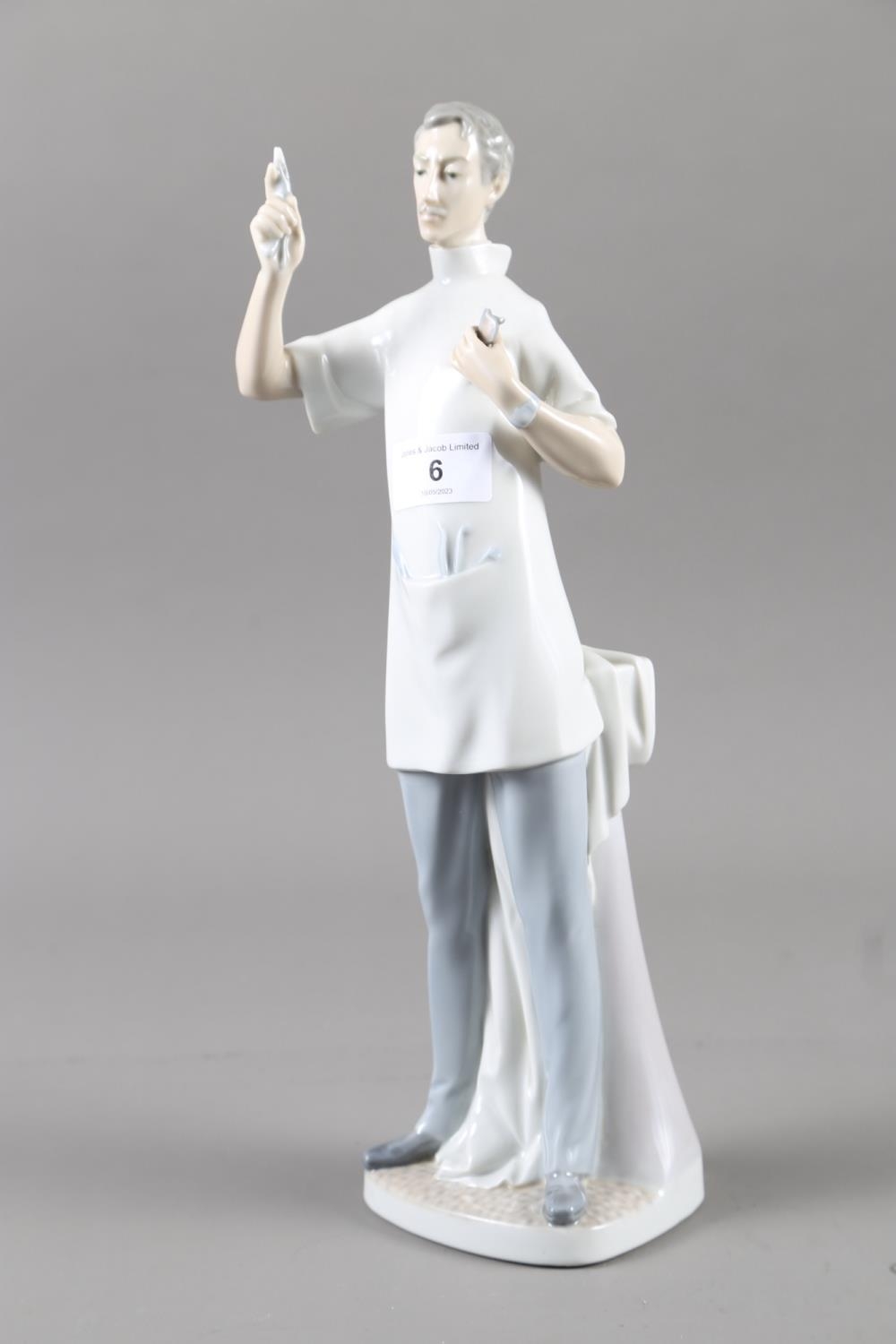 A Lladro figure, "The Dentist", 14" high