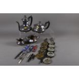 An EPBM four-piece tea and coffee set, a quantity of horse brasses, souvenir spoons, a silver and