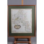 An 18th century hand-coloured map of Oxfordshire, by Robert Morden, in strip frame