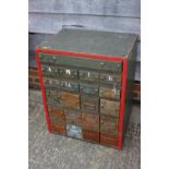 A green painted art metal tool chest of twenty-one drawers, in sizes, 22" wide x 17 1/2" deep x