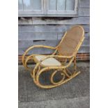 A rattan rocking chair and a rattan low coffee table