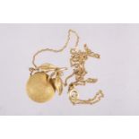 A yellow metal apple necklace pendant set with a clear stone, chain stamped 750, 8.4g gross