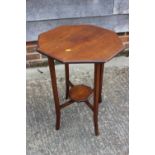 A walnut folding octagonal top occasional table, on splay supports, 18" dia x 23 1/2" high