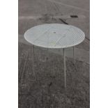 A cream painted folding bistro table, 33" dia x 28" high