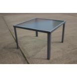 A glass top garden table, 43" square x 28" high
