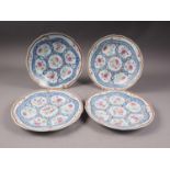 Four Chinese famille rose shaped edge plates with floral spray and blue twisted decoration, 9" dia