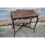 An early 20th century mahogany and inlaid serpentine top occasional table, on cabriole supports