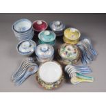 Seven Chinese polychrome decorated rice bowls and covers, rice spoons and other items