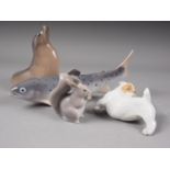 Four Royal Copenhagen models, comprising a seal (1441), 4 3/4" high , a squirrel (982), 2 1/2" high,