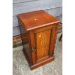 A 19th century rosewood and inlaid bedside cupboard enclosed panel door, on block base, 16 1/2" wide